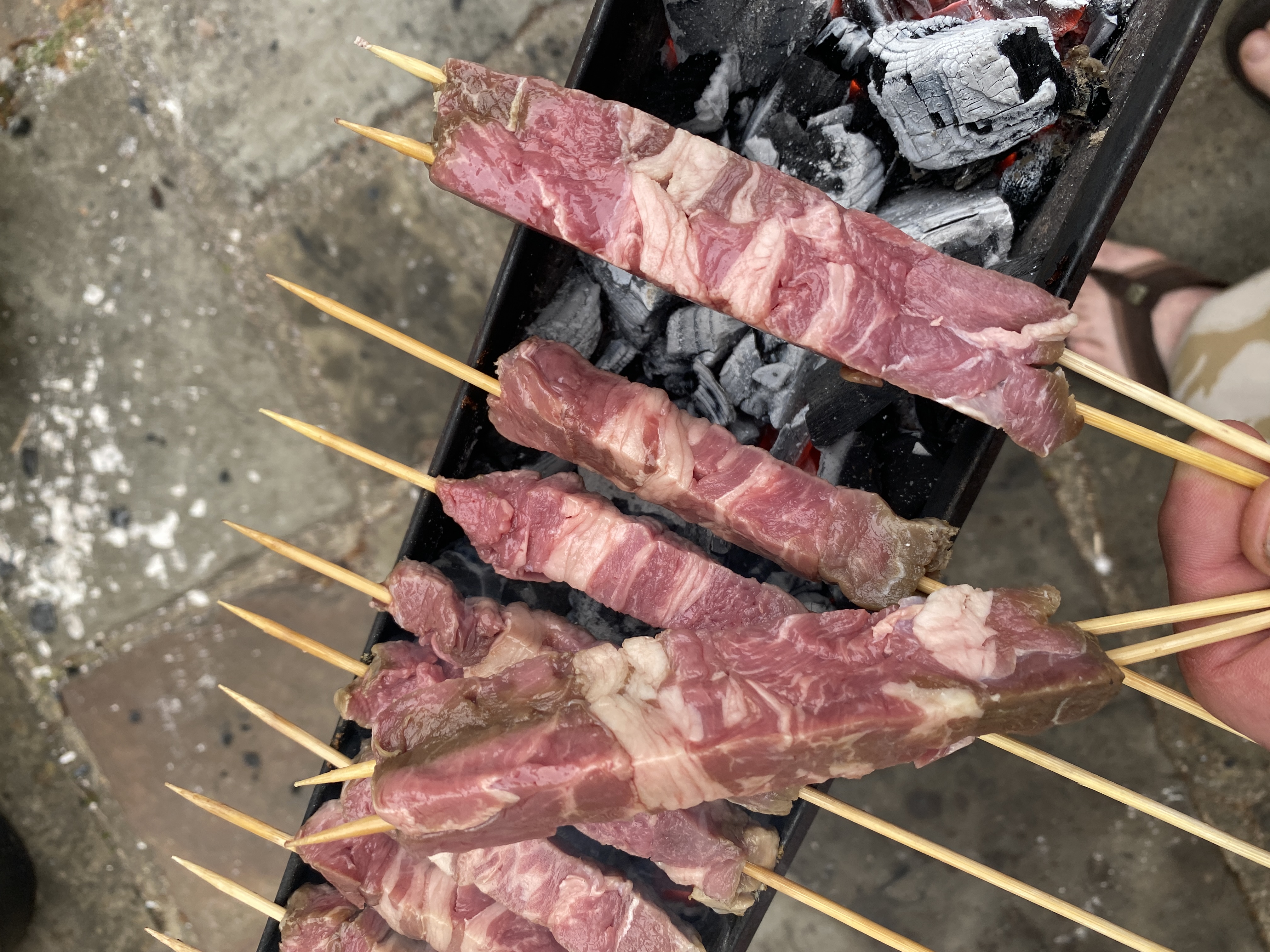 Close-up arrosticini on grill